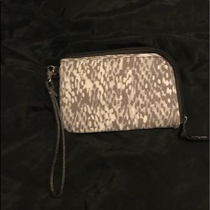 Thirty-One light grey snake print wristlet.